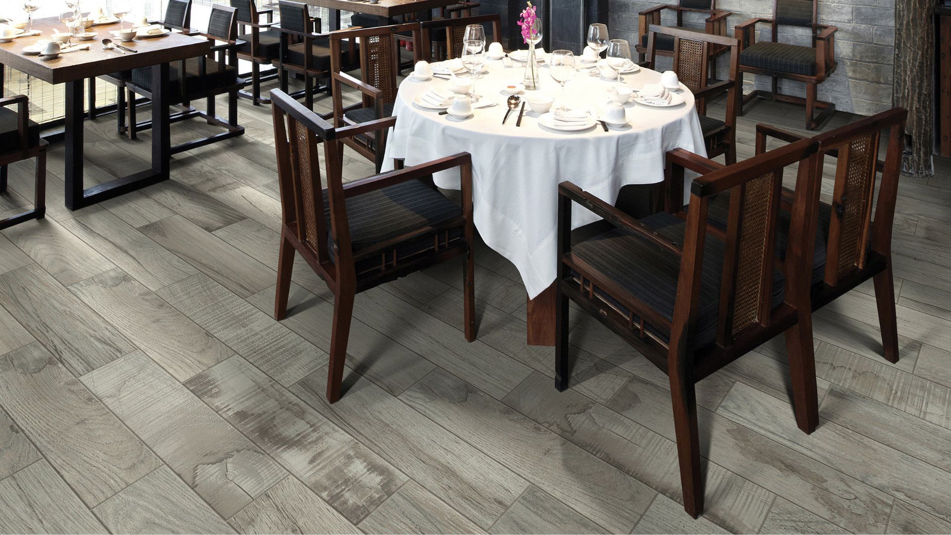 commercial wood look tile floors in a dining room